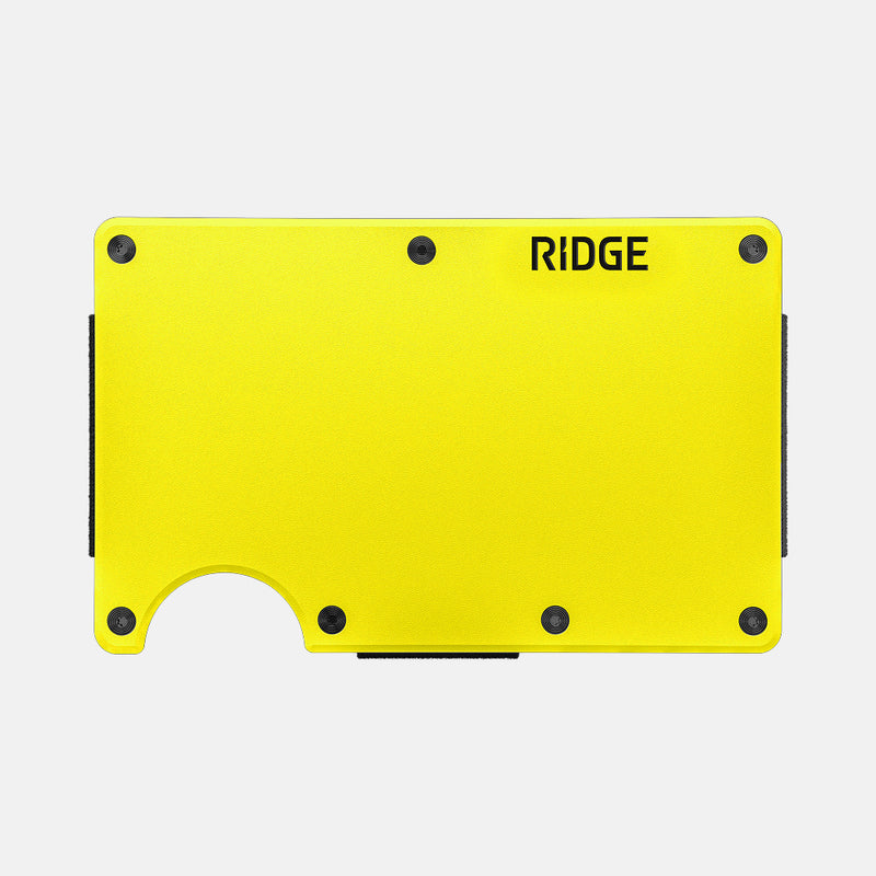 Ridge Wallet Hyper Lime, front view of bright yellow aluminum cardholder with black screws and cash strap, no hand.